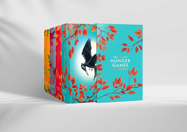 The Deluxe Hunger Games Collection ( Includes Hunger Games, Catching Fire, Mockingjay & The Ballad of Songbirds and Snakes ) by Suzanne Collins