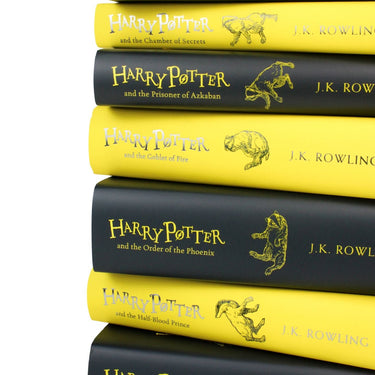 Photo of Harry Potter Hufflepuff House Collectors Edition Spines by J.K. Rowling on a White Background
