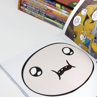 Photo of Adventure Time The Graphic Novel Collection Vol 1-10 Pages on a White Background